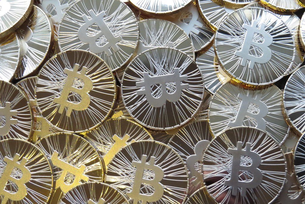 A heap of gold and silver Bitcoin-style coins