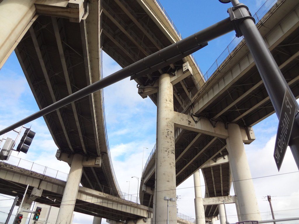 Stacked highway overpasses seen from below